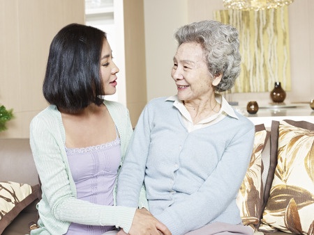 elderly mother and her daughter